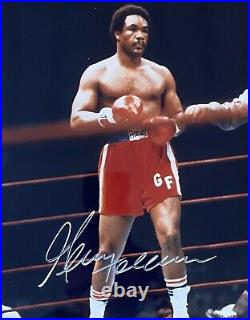 An original signed photograph by George Foreman with COA