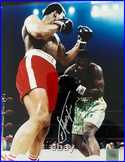 An original signed photograph by Joe Frazier (with signed COA)