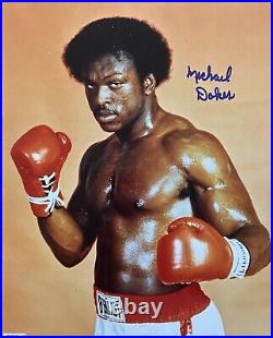 An original signed photograph by Michael Dokes (with COA)