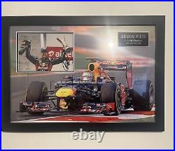 Hand signed Sebastian Vettel poster in glass frame 100% authentic with COA