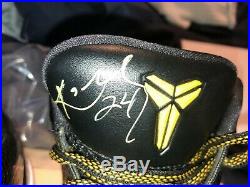 Lakers Kobe Bryant autographed shoes worn by him with full COA from DC sports
