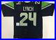 MARSHAWN-LYNCH-AUTOGRAPHED-SEAHAWKS-JERSEY-with-BECKETT-COA-L19752-01-owe