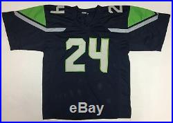 MARSHAWN LYNCH AUTOGRAPHED SEAHAWKS JERSEY with BECKETT COA #L19752