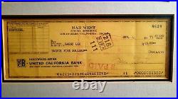 Mae West personally signed cheque. Professionally matted with COA