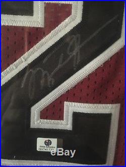 Michael Jordan Red autographed jersey, Framed (black frame) With COA