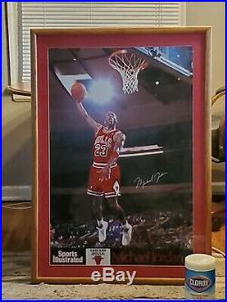 Michael Jordan autographed magazine with framed full size poster. Signed COA