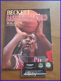 Michael Jordan autographed magazine with framed full size poster. Signed COA