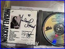 Michael jackson signed photo With COA 1995 CD
