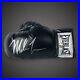 Mike-Tyson-Hand-Signed-Black-Everlast-Boxing-Glove-With-COA-199-01-xwlw