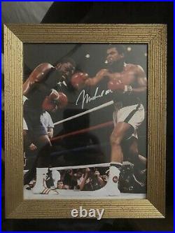 Muhammad Ali signed 8 X 10 photo framed in gold Frame with Original COA