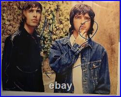 Oasis Signed Photograph With COA