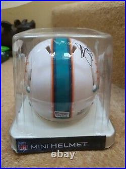 Signed nfl mini speed helmet. MIAMI DOLPHINS. With COA mint cond. Original box